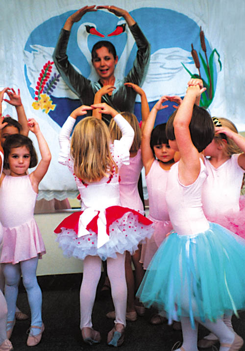Lenka dancing with children